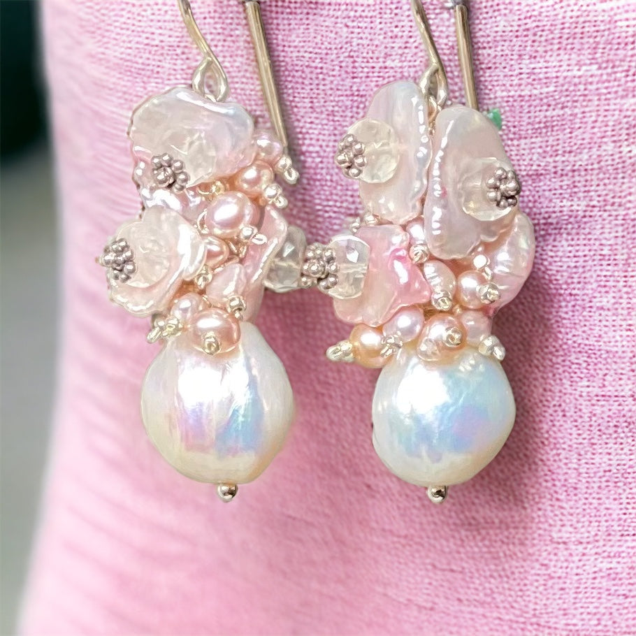 white metallic Edison pearl earrings topped with clusters of blush keishi pearls and cascading tiny pink blush pearl on sterling silver