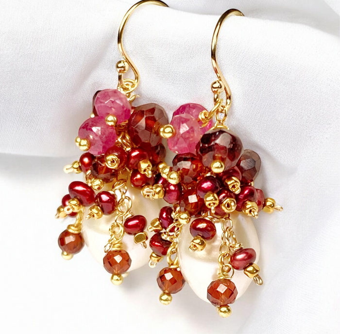 White freshwater pearls with cascading red garnets and pearls with pink sapphires in gold fill