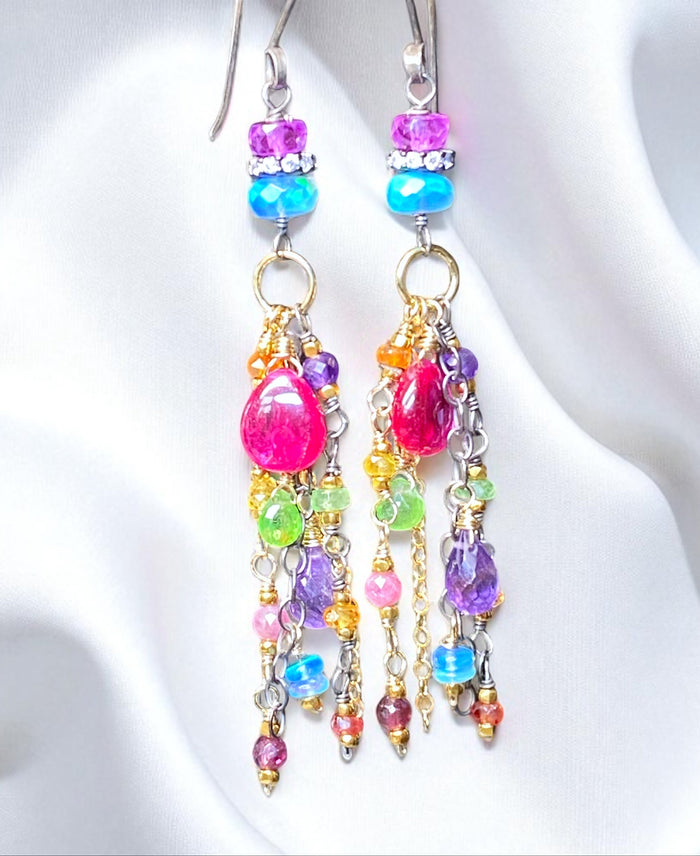 Colorful beaded earrings on a white background
