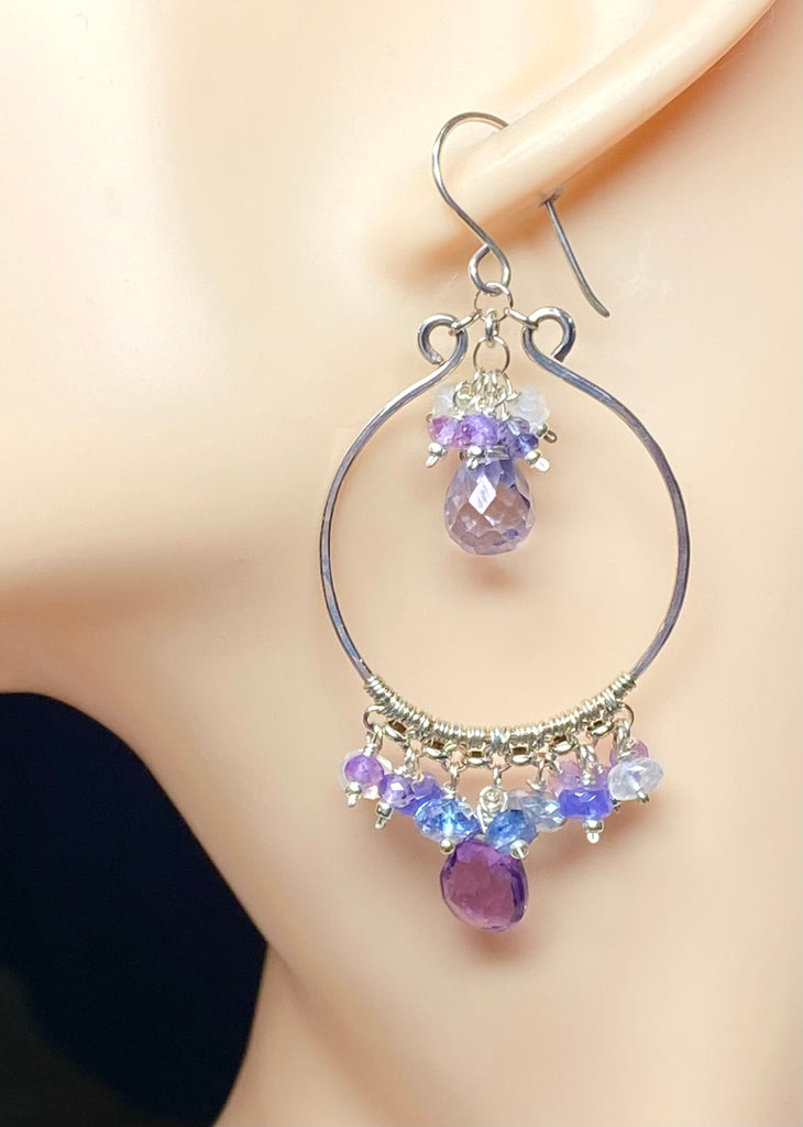 Colorful gemstone chandelier earrings amethyst tanzanite blue violet quartz dangling on mannequin head