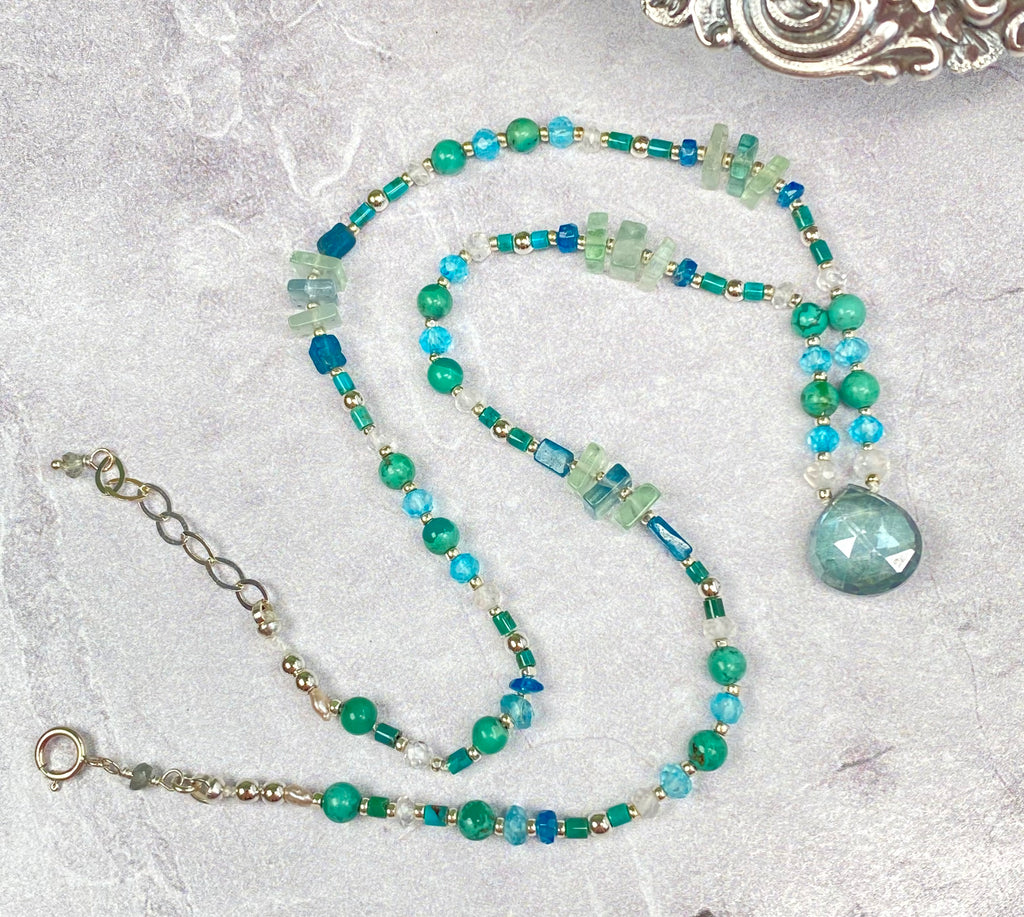 Mystic Aqua Quartz Pendant; Silk Knotted Aqua Blue Beaded Necklace