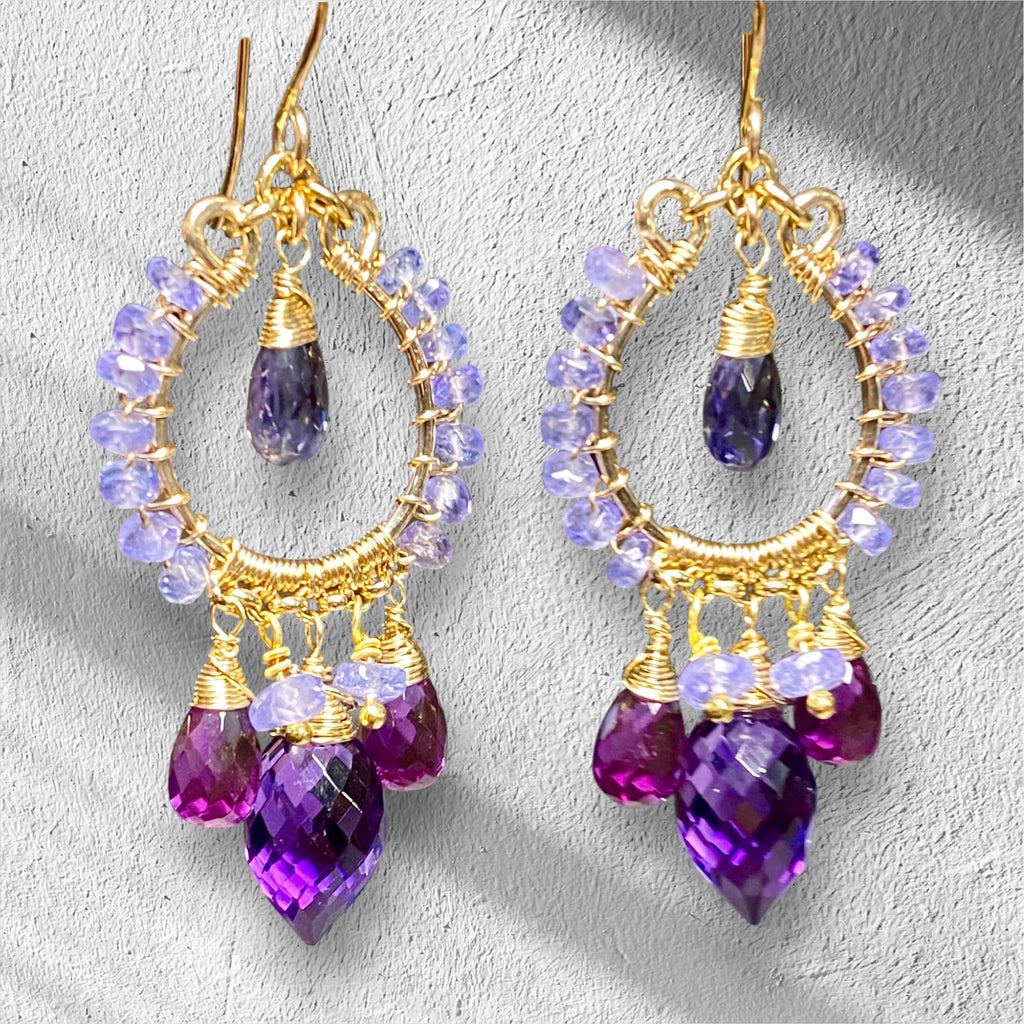 Tanzanite iolite amethyst violet quartz gold filled chandelier earrings against light grey background showing artisan craftsmanship