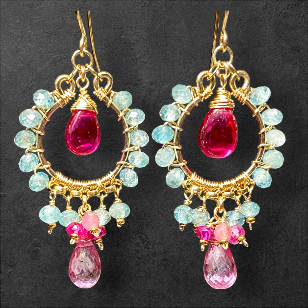 "Natural blue zircon and pink gemstone chandelier hoop earrings in 14K gold fill on black background"