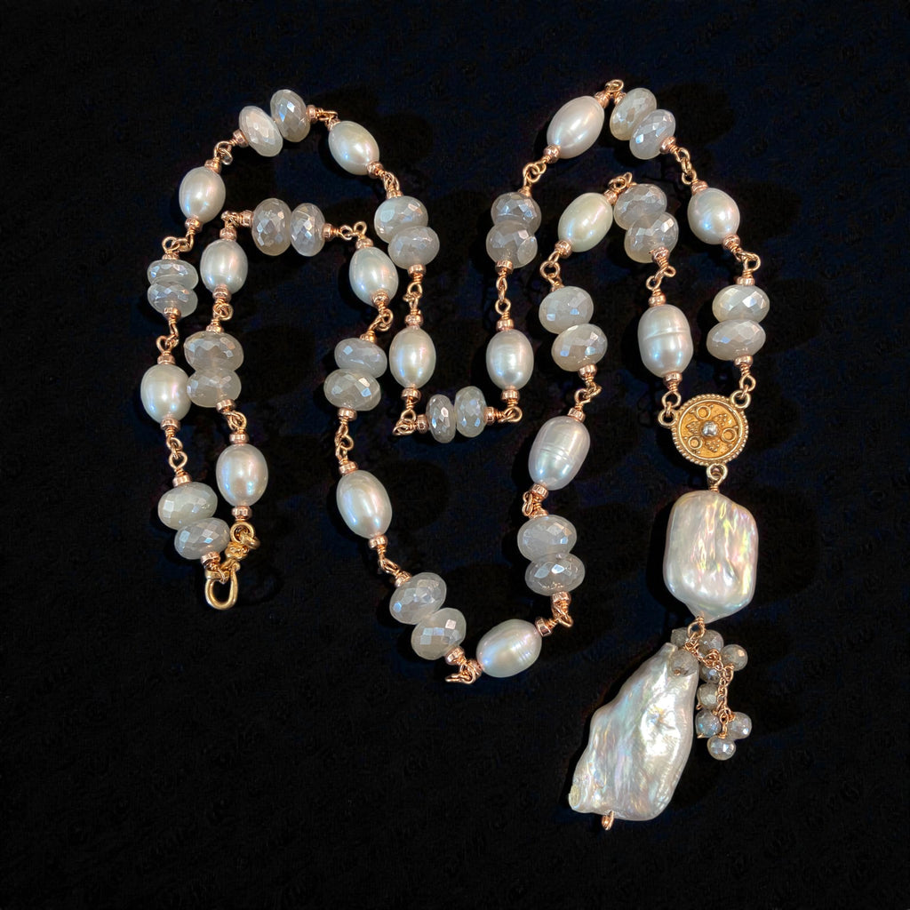 Long grey pearl moonstone sautoir necklace rose gold wire wrapped on black background