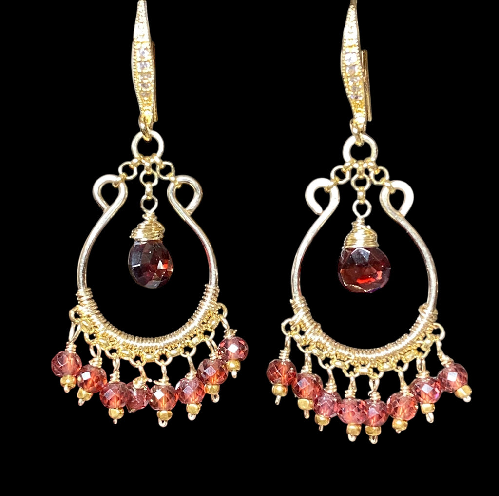 Red garnet chandelier hoop earrings 14kt gold fill against black background