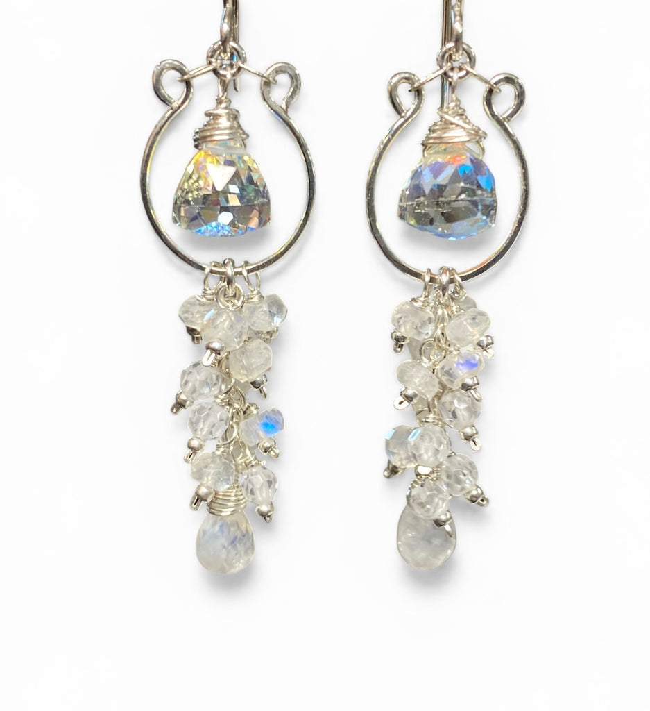 Sterling Silver chandelier earrings with white gemstone stones on a white background,\.