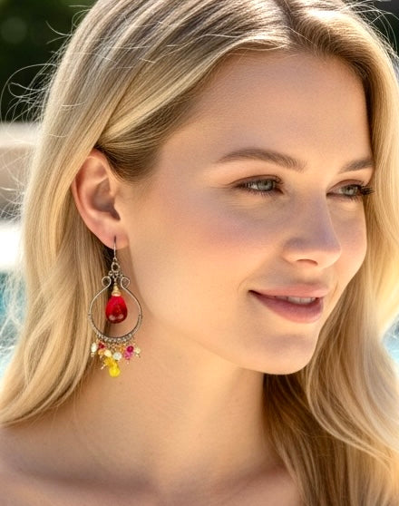  Pink rubellite peridot hoop earrings on blonde model by pool