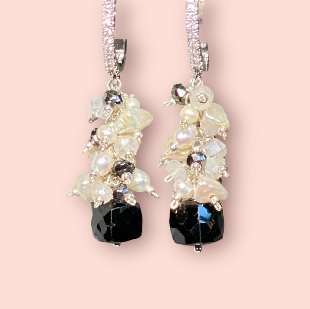 black spinel cubes topped with clusters of lustrous pearls, moonstones and sparkly black terahertz beads.