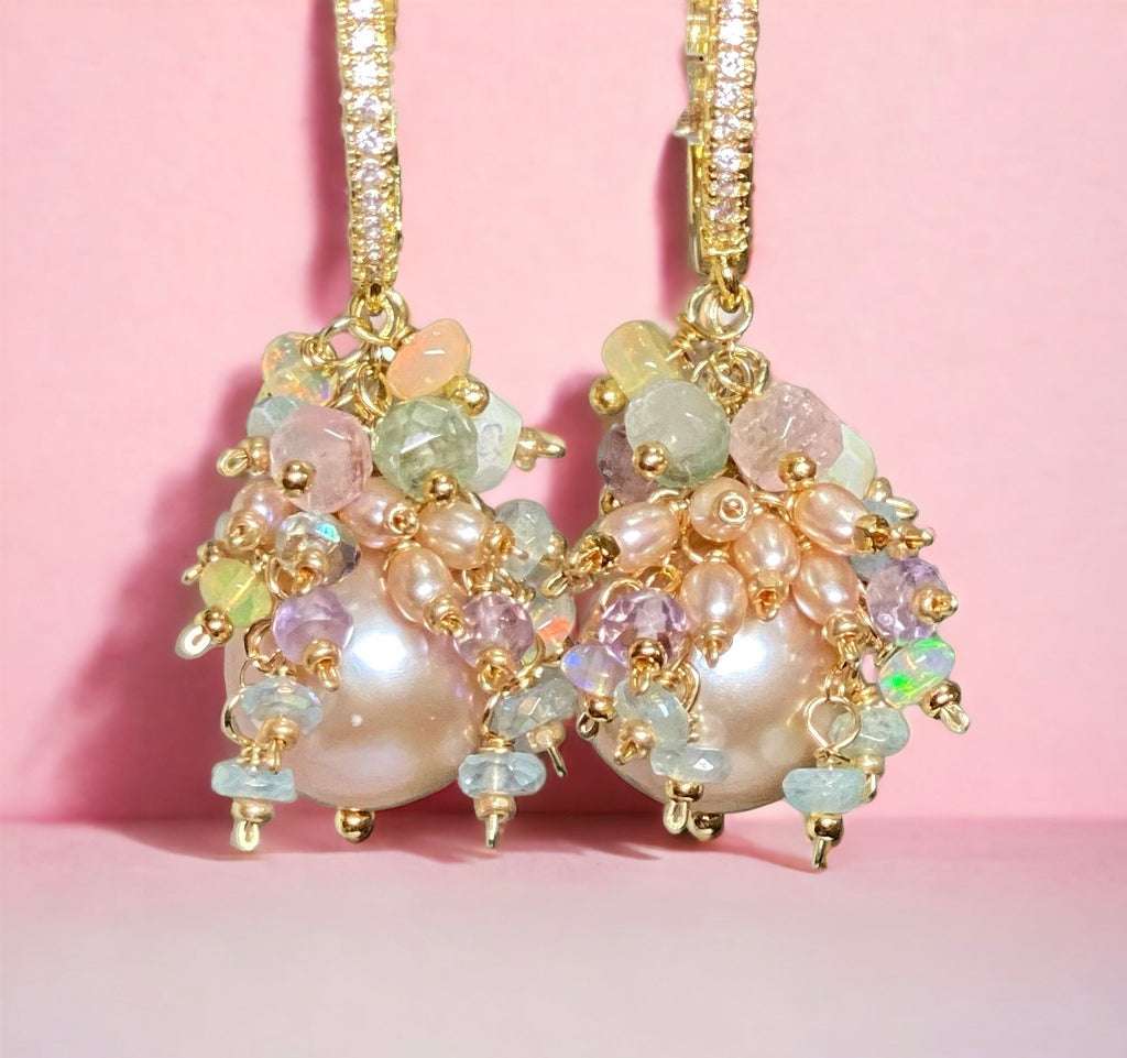 Pink round pearl earrings with clusters of gemstones: pastel tourmalines, opals, tiny pearls and more