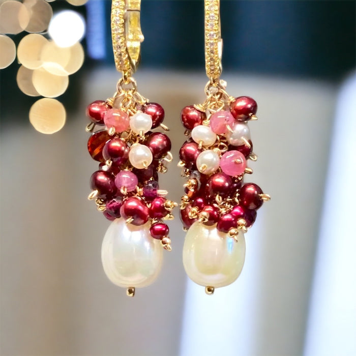 ivory cream pearl earrings with clusters of red and pink pearls and gemstone