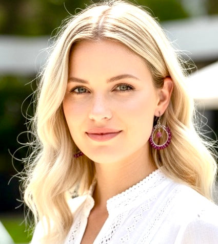 Rhodolite garnet hoop earrings mixed metals mystic plum pink topaz 14kt gold fill oxidized sterling silver worn by blonde model in white dress headshot
