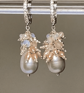 silver freshwater pearls with clusters of pink pearls, gems and fiery opals in sterling silver